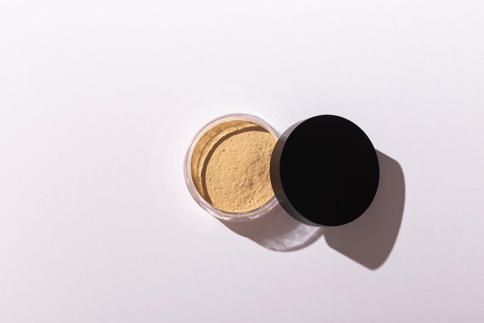 mineral powder foundation isolated on a white background eco friendly and organic beauty products