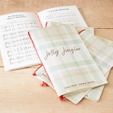 diy caroling books on a light brown surface