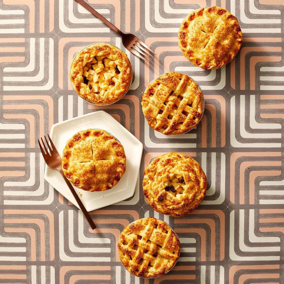mini apple pies on patterned table