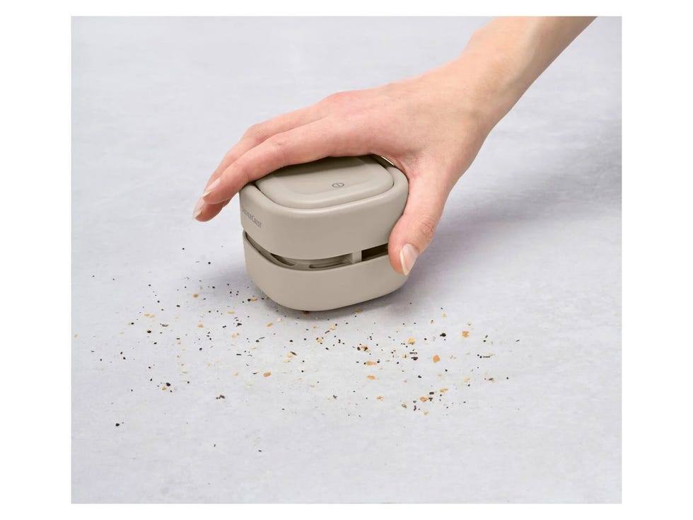 mini aspiradora de mano para las migas de la mesa