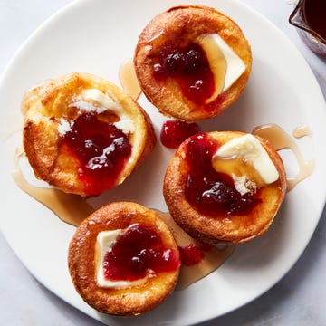 Mini Cranberry Popovers mini cranberry popovers topped with butter, cranberry sauce, and syrup