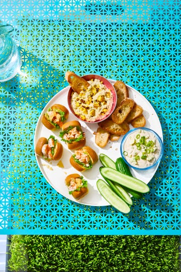 mini shrimp rolls on a white plate