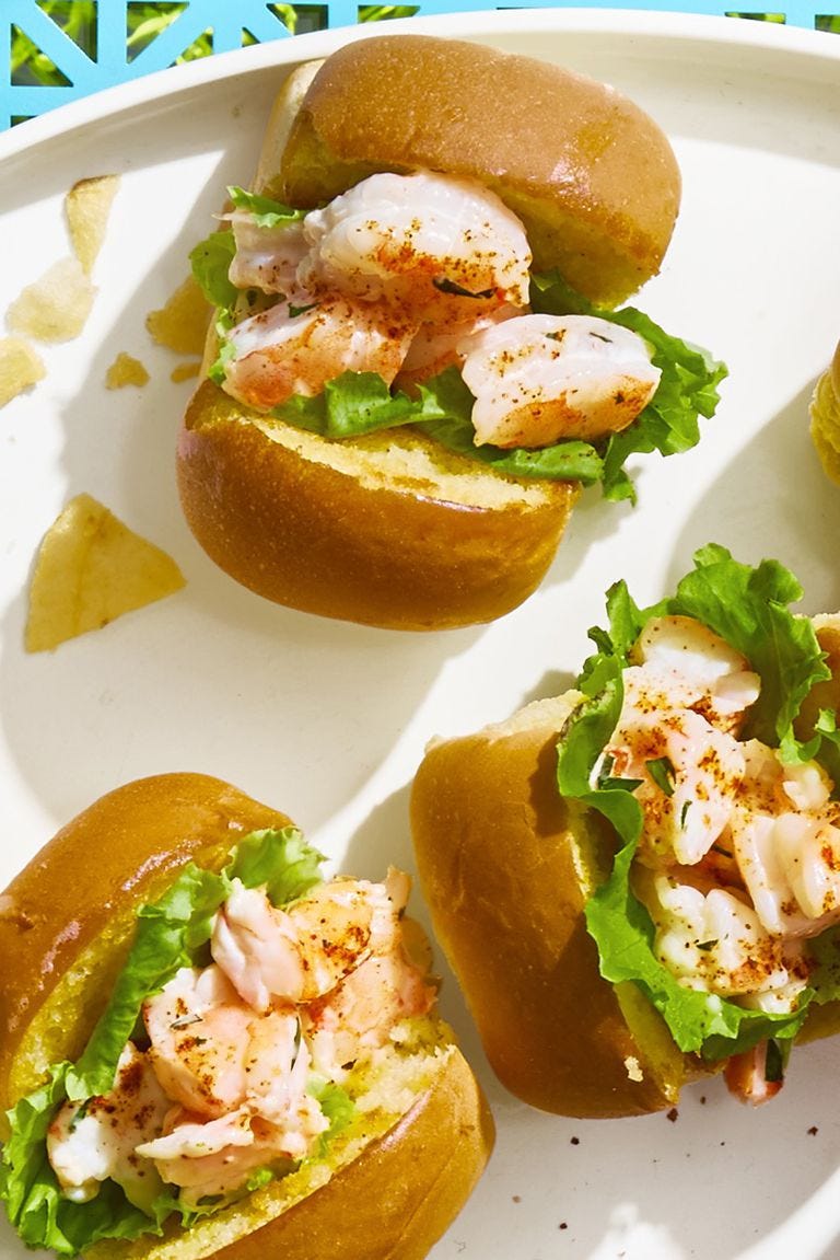 mini shrimp rolls on a white plate