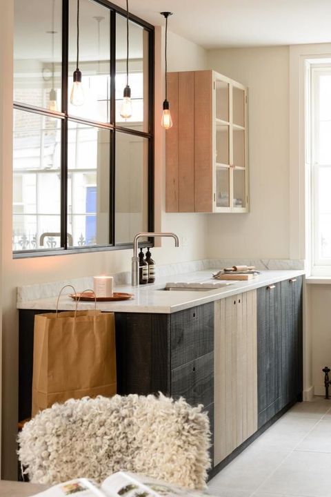 minimalist kitchen with alternating cabinets
