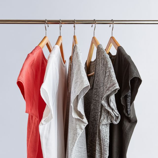 5 short sleeve shirts hanging on a clothing rack