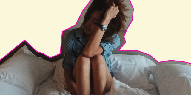 Vrouw met depressie en PTSS in bed