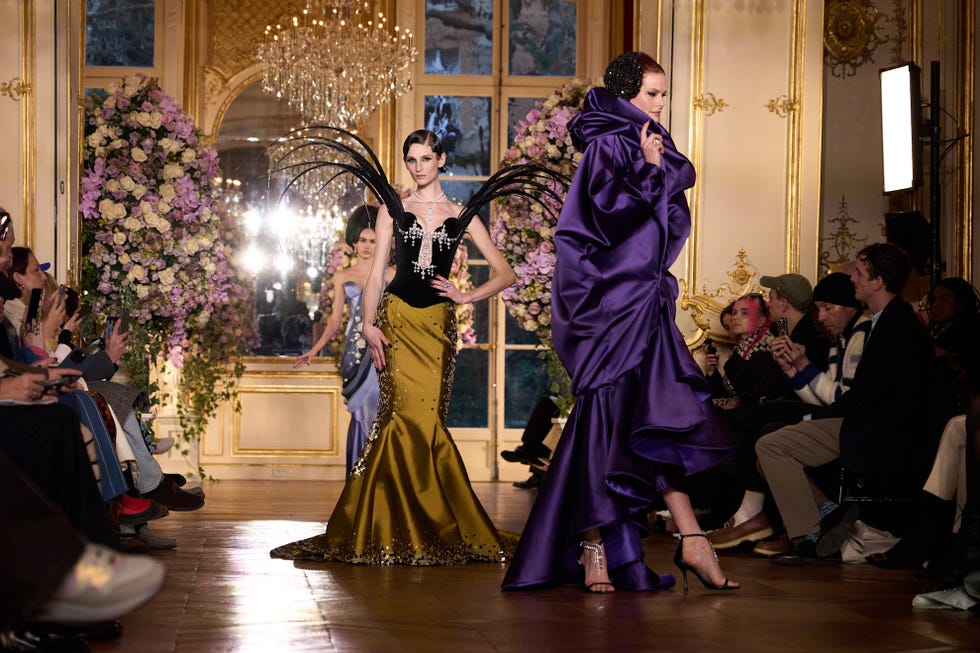 Fashion models showcasing elegant dresses on a runway