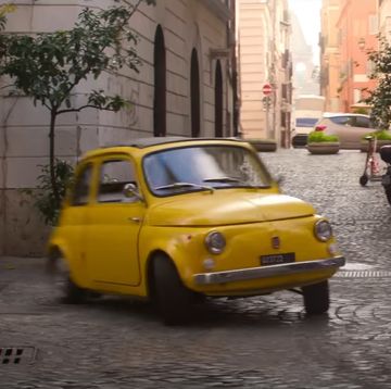 a yellow fiat 500 drifts over cobblestones in mission impossible dead reckoning part 1