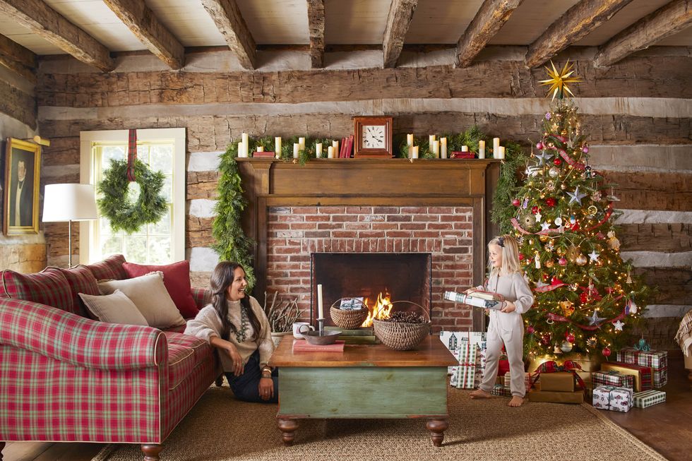 old fashioned cabin christmas living room, christmas tree, brick fireplace