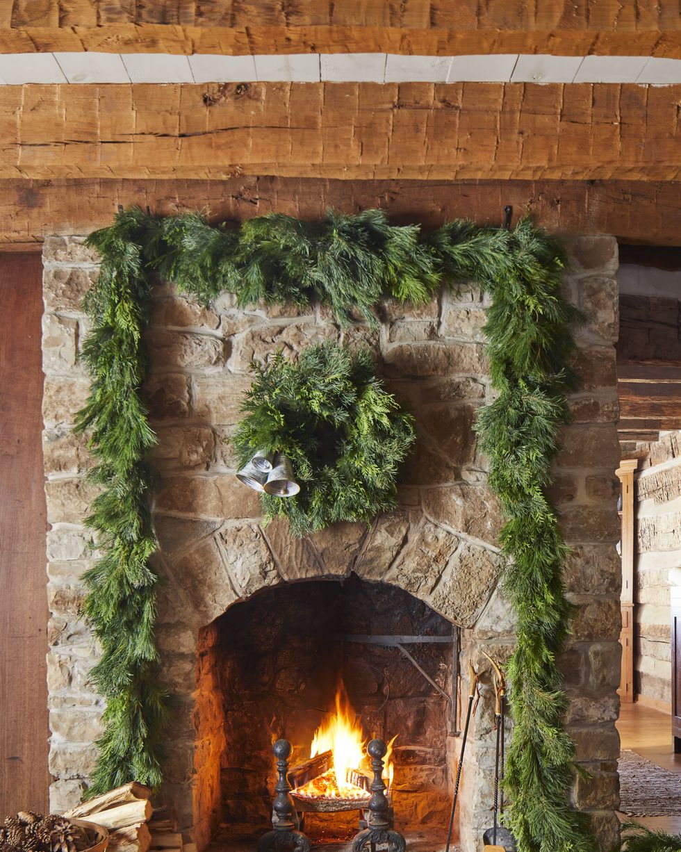 1830s riverwoods cabin in case, missouri katherine hacker, caretaker, john kilgore, owner an old fashioned cabin christmas limestone fireplace, christmas greenery