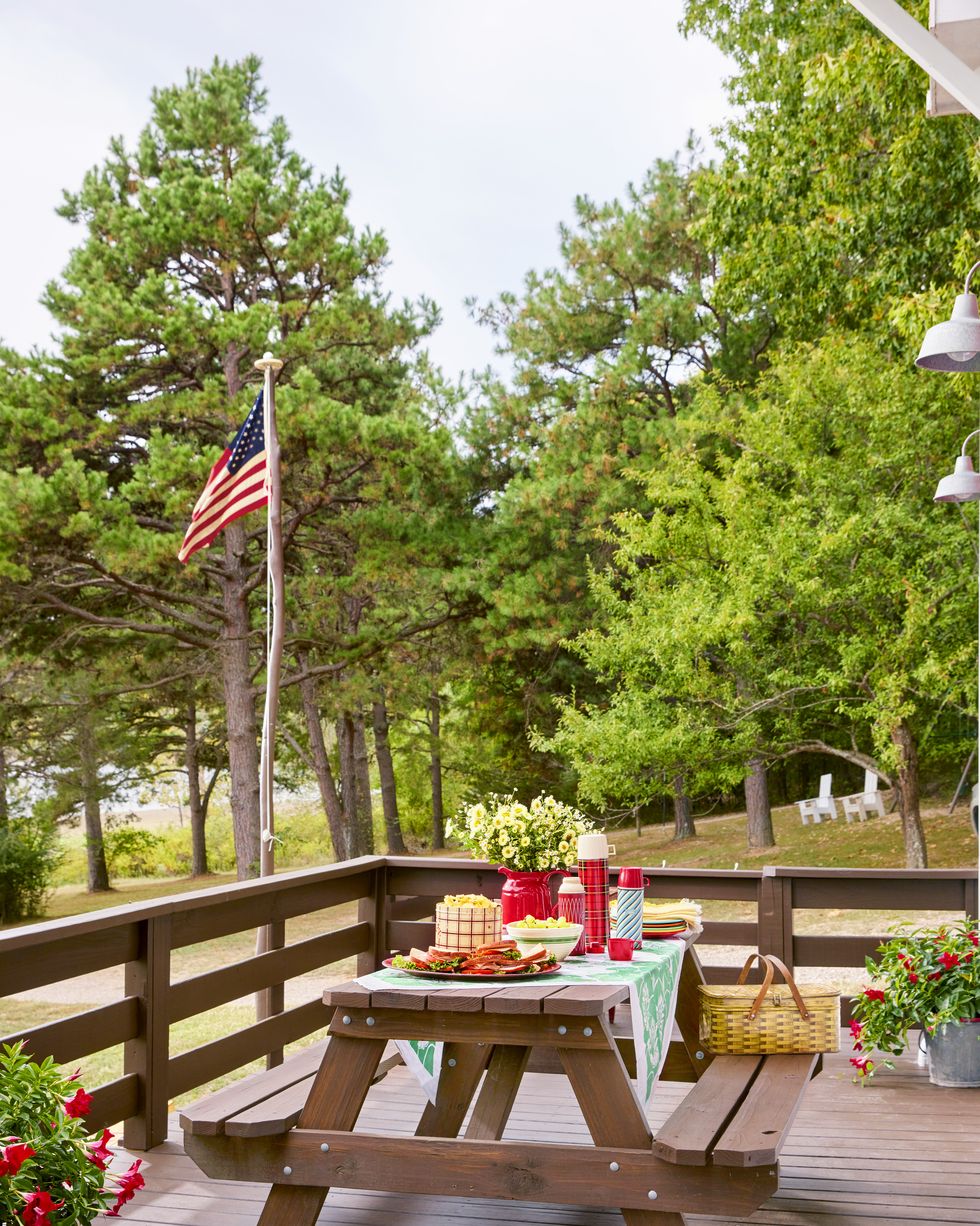nostalgic lake cabin picnic table and american flag