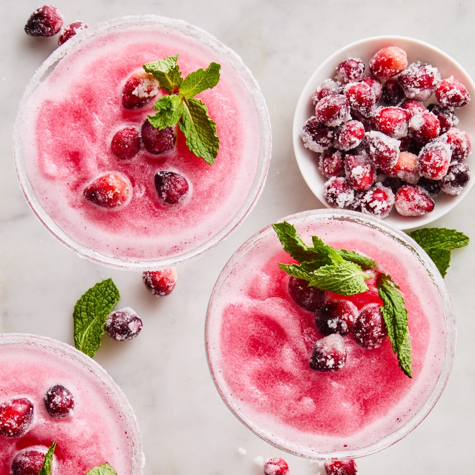 pink slushy margaritas with sugared cranberries