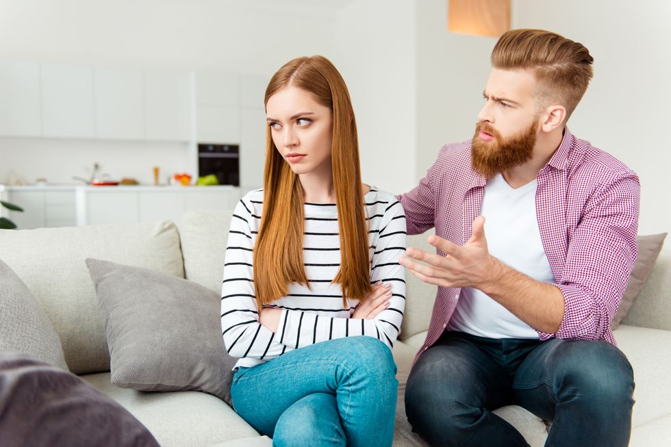 misunderstanding people person concept puzzled annoyed handsome irritated boyfriend trying to figure out the reason of resentment pretty girl doesn't want to listen to boyfriend sitting crossed arms