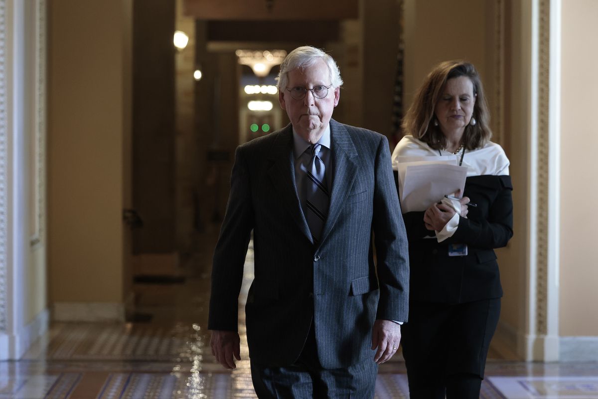 washington, dc   december 07  us senate minority leader mitch mcconnell r ky walks to the senate chamber in the capitol building on december 07, 2021 in washington, dc mcconnell and senate majority leader chuck schumer d ny have said they are near an agreement on legislation to lift the debt ceiling photo by anna moneymakergetty images