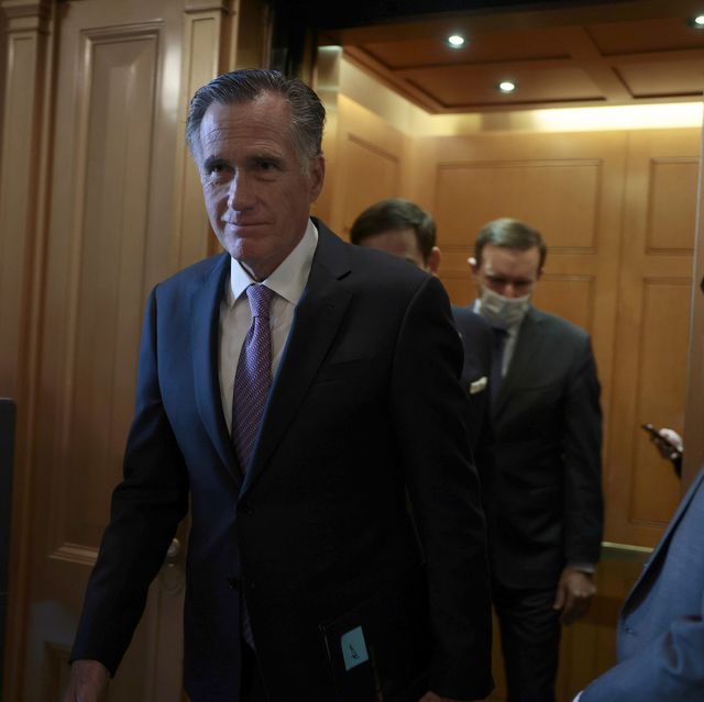 washington, dc   december 15 sen mitt romney r ut walks to the senate chambers of the us capitol building for a vote on december 15, 2021 in washington, dc the senate voted to pass the national defense authorization act, which sends the bill to the desk of us president joe biden photo by anna moneymakergetty images