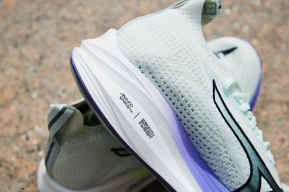 running shoes showcasing brand and technology details