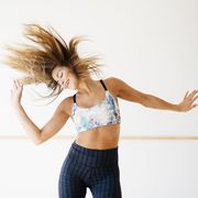 female dancer practicing at home