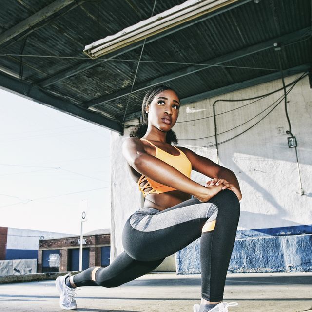 https://hips.hearstapps.com/hmg-prod/images/mixed-race-woman-stretching-legs-on-loading-dock-royalty-free-image-1595537698.jpg?crop=0.529xw:0.793xh;0.199xw,0.130xh&resize=640:*