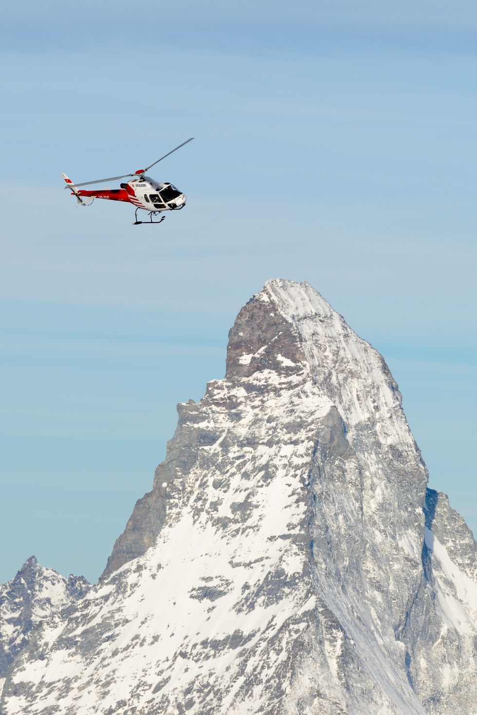 Helicopter, Rotorcraft, Vehicle, Extreme sport, Geological phenomenon, Aircraft, Glacial landform, Helicopter rotor, Mountain range, Flip (acrobatic), 
