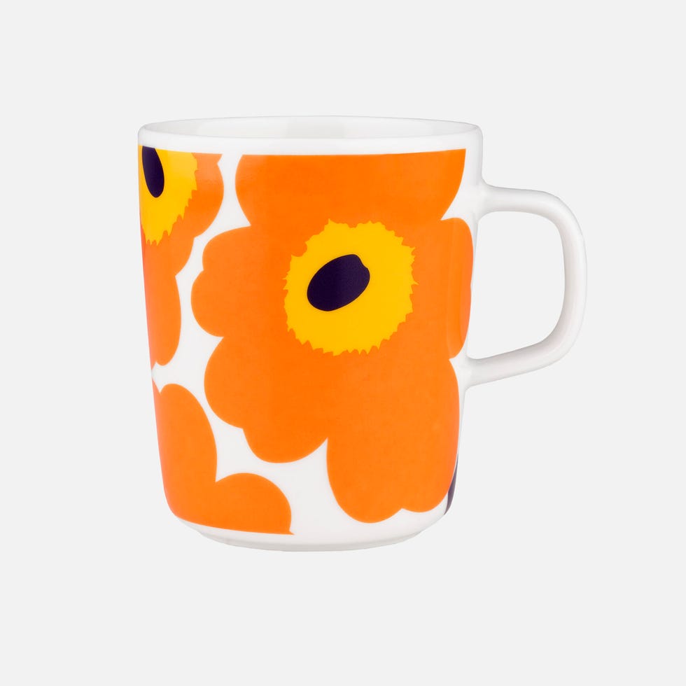 a mug with a cartoon face