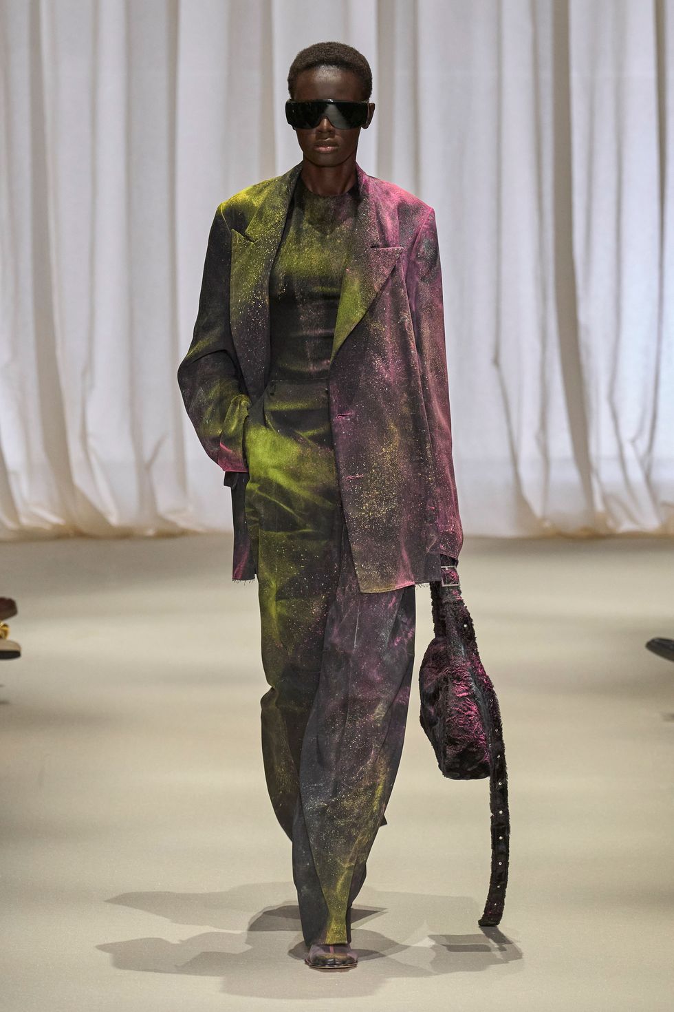 a person wearing a camouflage suit