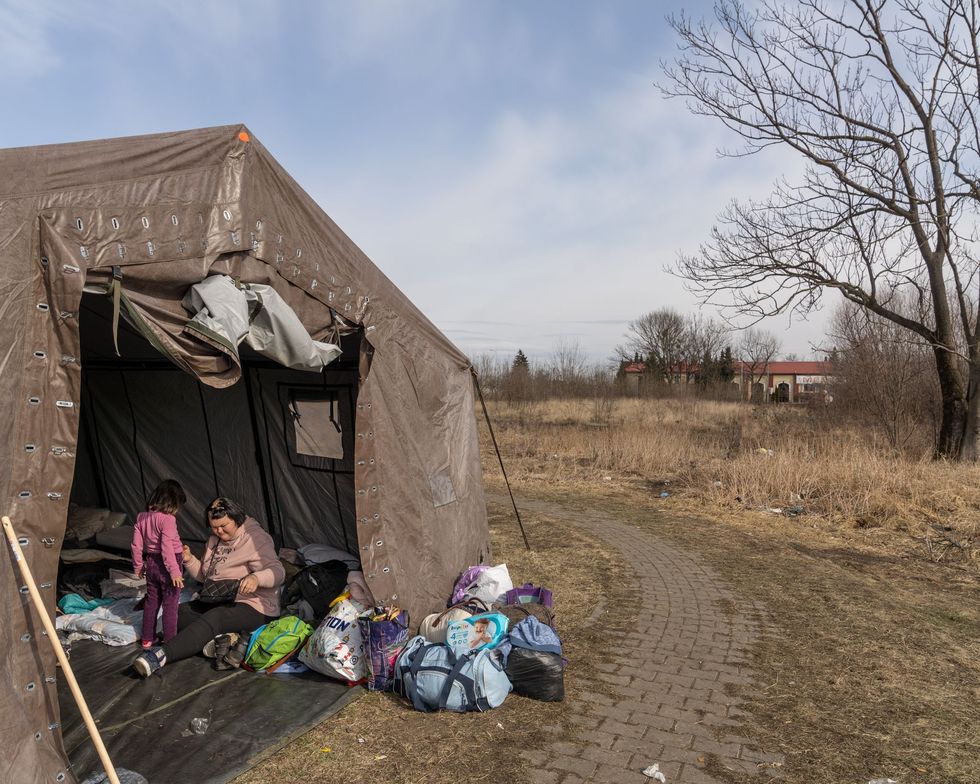 Refugees from Ukraine try to find some normality in their tent at the reception point for refugees in Medyka Poland as they wait to continue their passage to other destinations in Europe