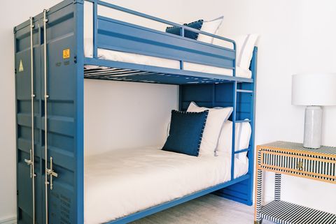 blue shipping container style bunk beds