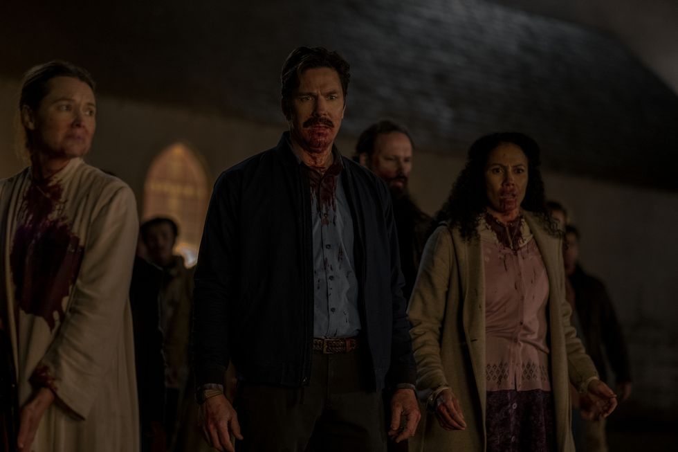 midnight mass l to r samantha sloyan as bev keane, michael trucco as wade scarborough and crystal balint as dolly scarborough in episode 107 of midnight mass cr eike schroternetflix © 2021
