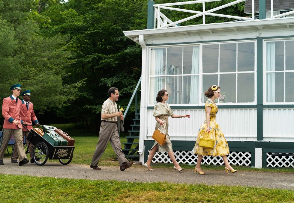 Abe and Rose Weissman arrive with their daughter Midge at a resort in the Catskills during The Marvelous Mrs. Maisel season two. 
