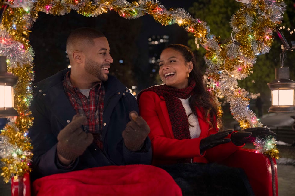 devale ellis as teddy and christina milian as layla in meet me next christmas