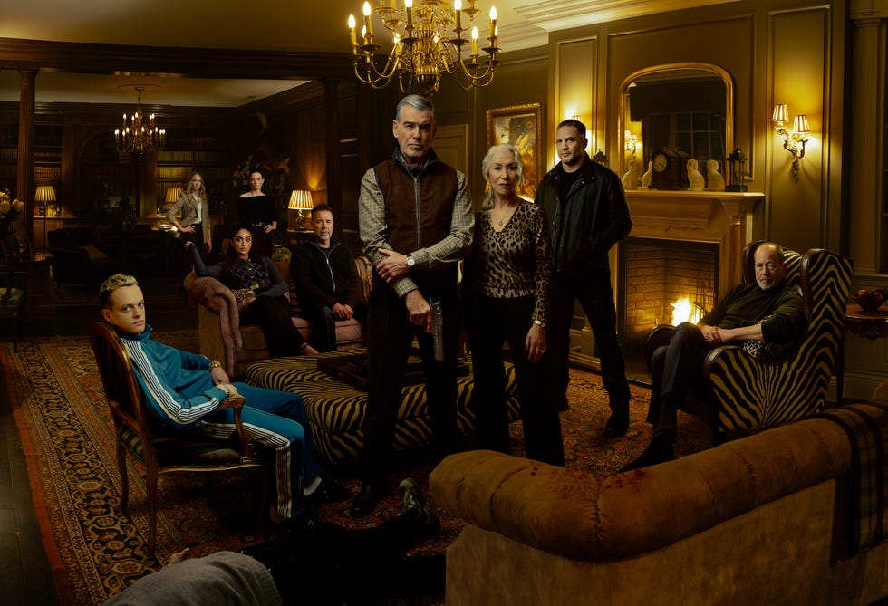 l r anson boon as eddie harrigan, joanne froggatt as jan da souza, mandeep dhillon as seraphina harrigan, lara pulver as bella harrigan, paddy considine as kevin harrigan, pierce brosnan as conrad harrigan, helen mirren as maeve harrigan, tom hardy as harry da souza, and daniel betts as brendan harrigan in mobland, season 1, streaming on plaramount+ 2025. photo credit: jason bell/plaramount+