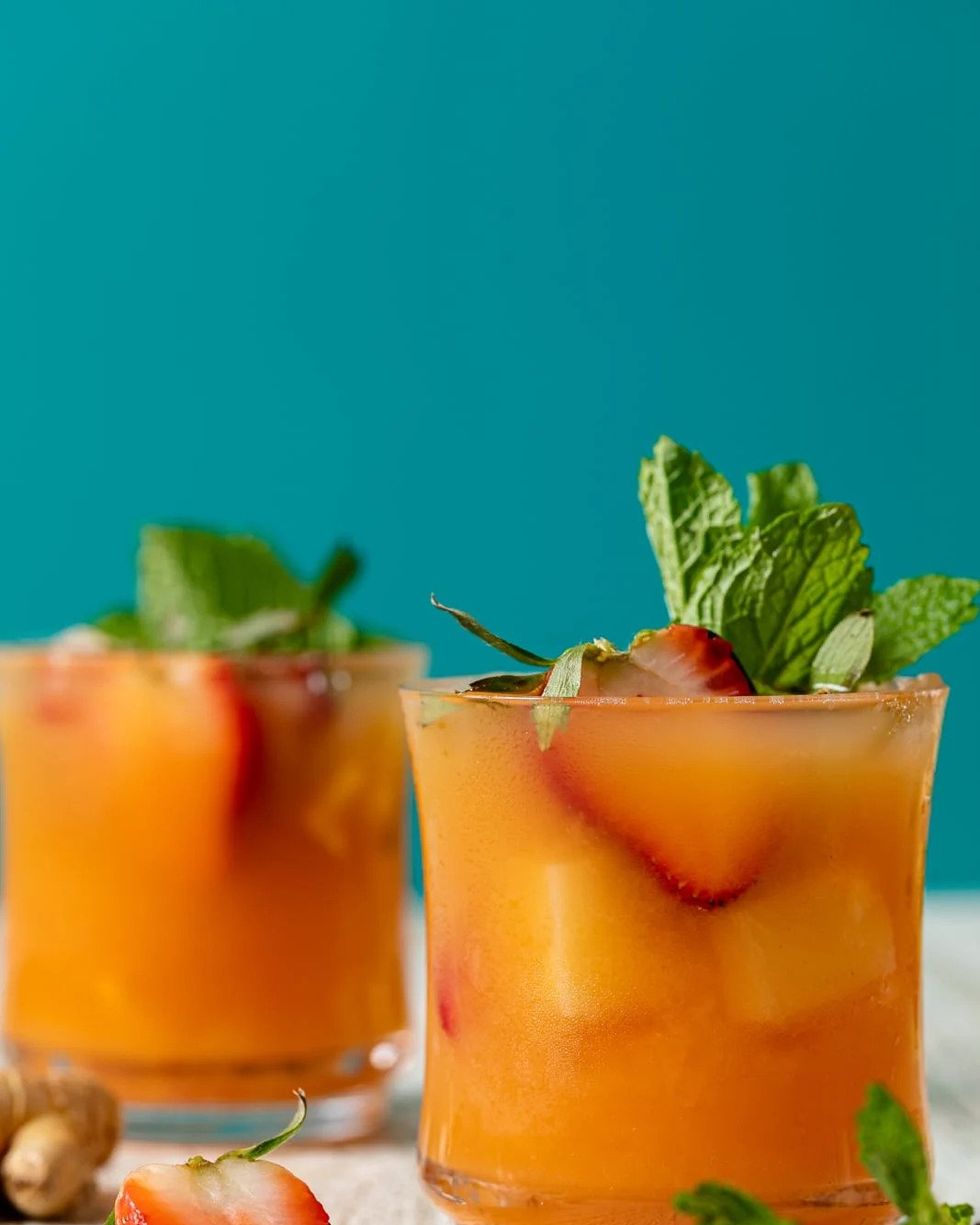 rum punch mocktail with strawberries