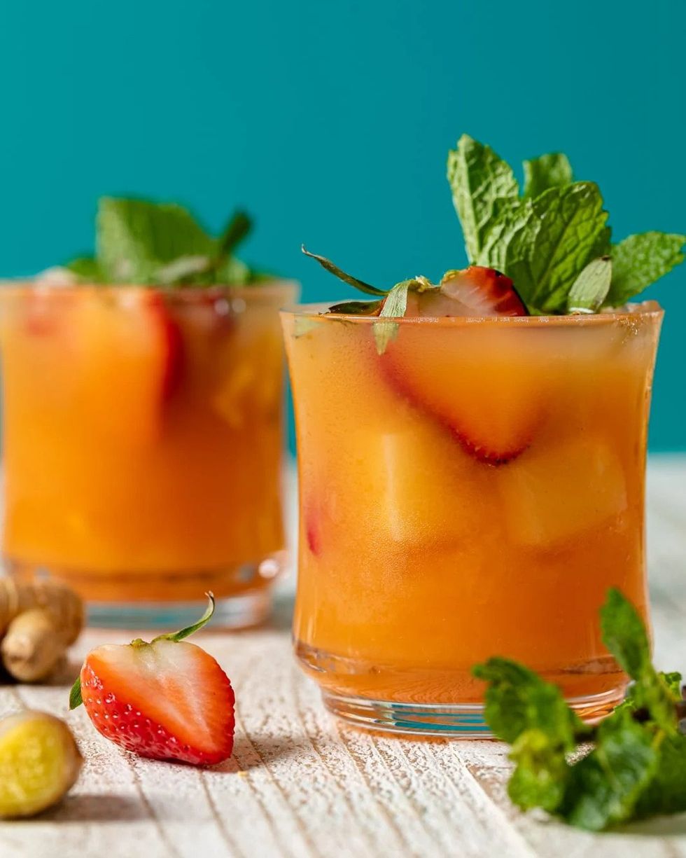 rum punch mocktail with strawberries
