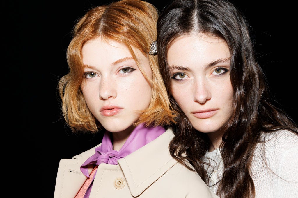 model and jace higgins are seen backstage at the ermanno news photo
