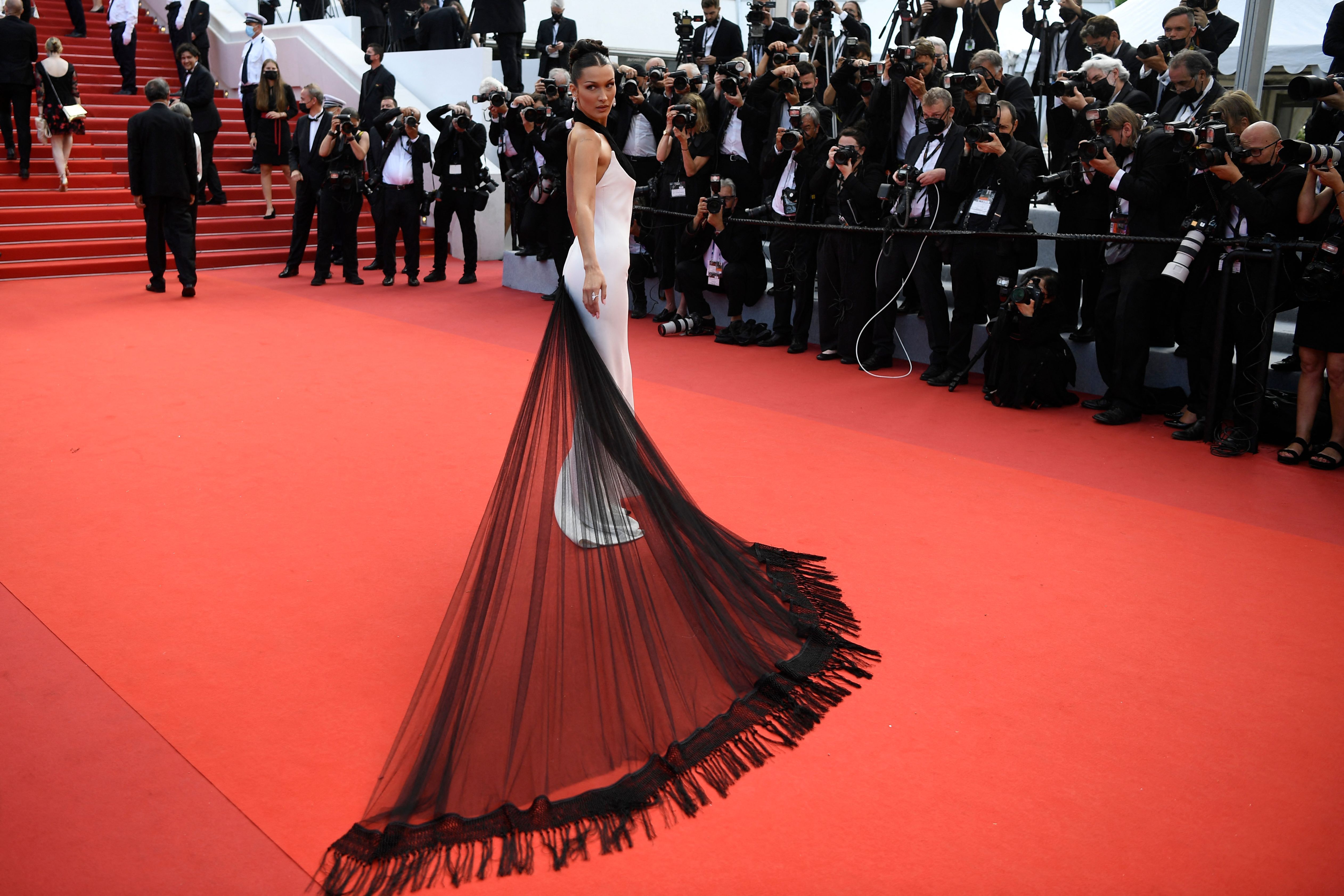 Bella Hadid Wears a Black and White Column Gown at Cannes Film Festival in  2021