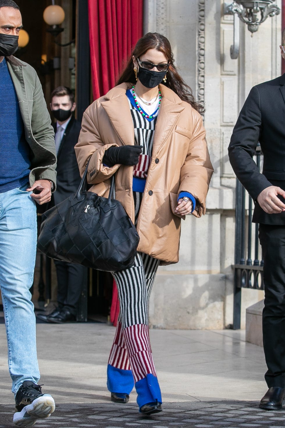 Gigi Hadid in beige trench coat and sweatpants in NYC on April 27 ~ I want  her style - What celebrities wore and where to buy it. Celebrity Style