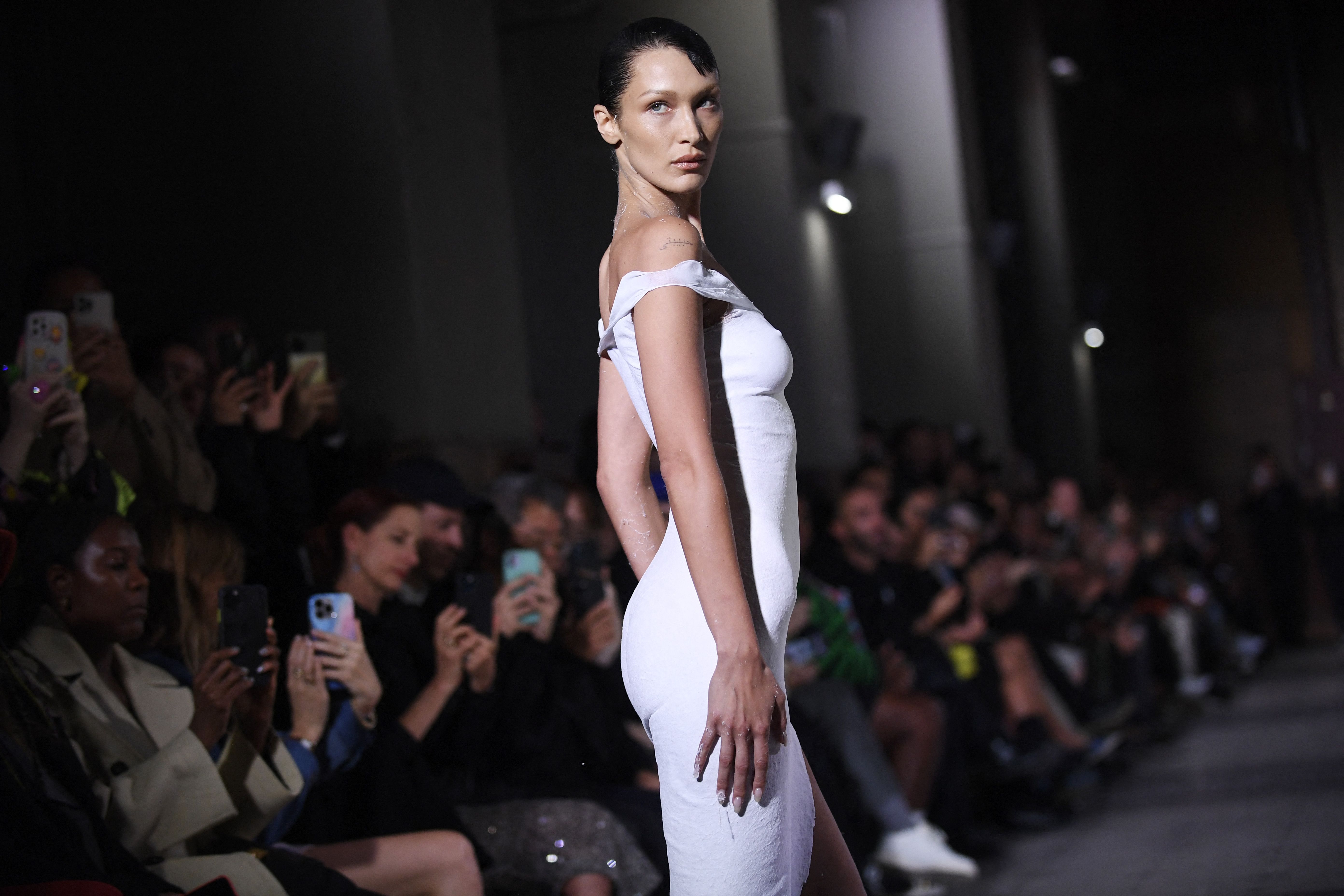 Bella Hadid spray painted with white dress during Paris Fashion Week |  Lifestyle | Independent TV