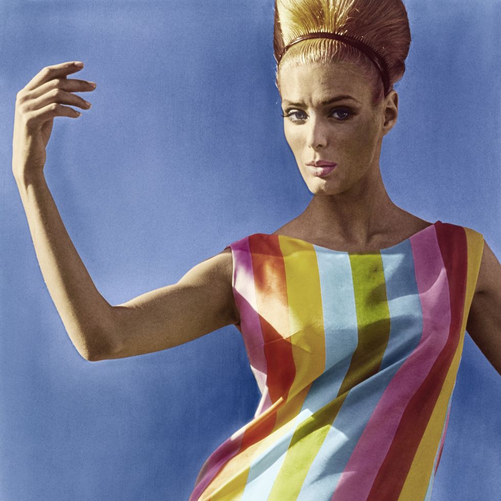model deborah dixon wearing silk shift in colored stripes also known as debbie dixon photo by bert sterncondé nast via getty images