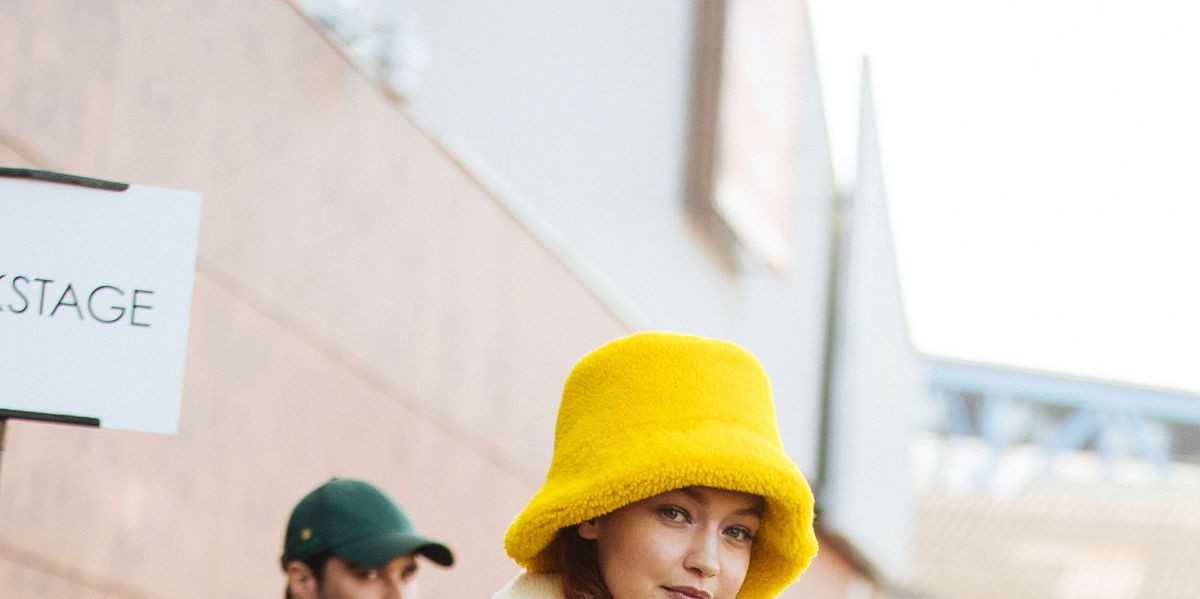 Gigi Hadid's Latest OOTD Features White Eyeliner and the Coziest Yellow Hat  — See Photos