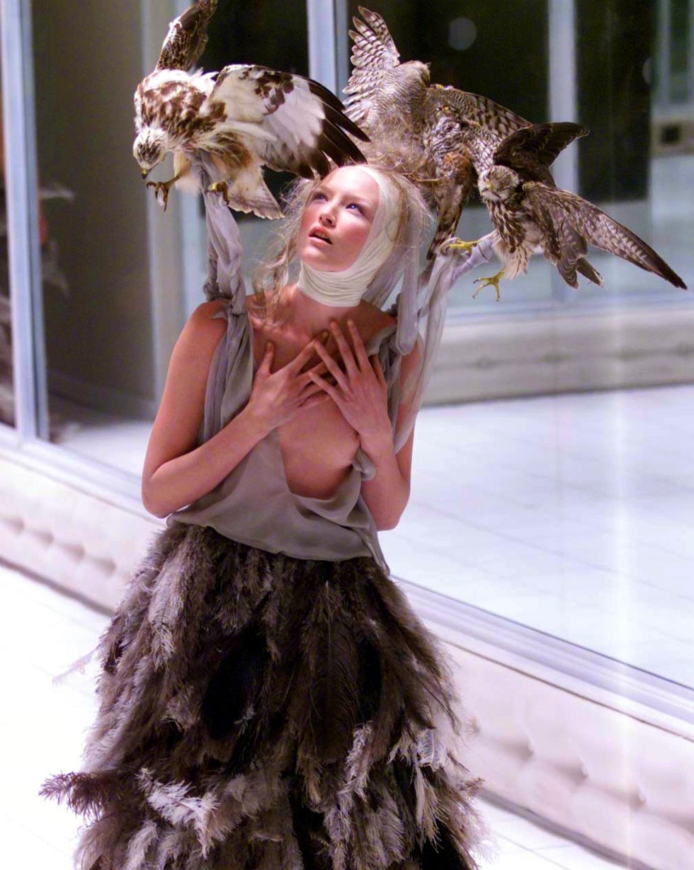 A model presents a creation by Alexander Mcqueen f
