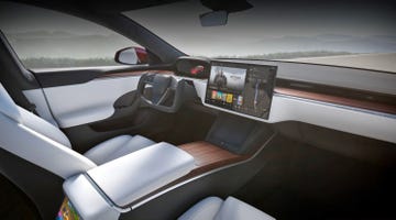 2023 tesla model s interior is shown complete with a yoke style steering setup