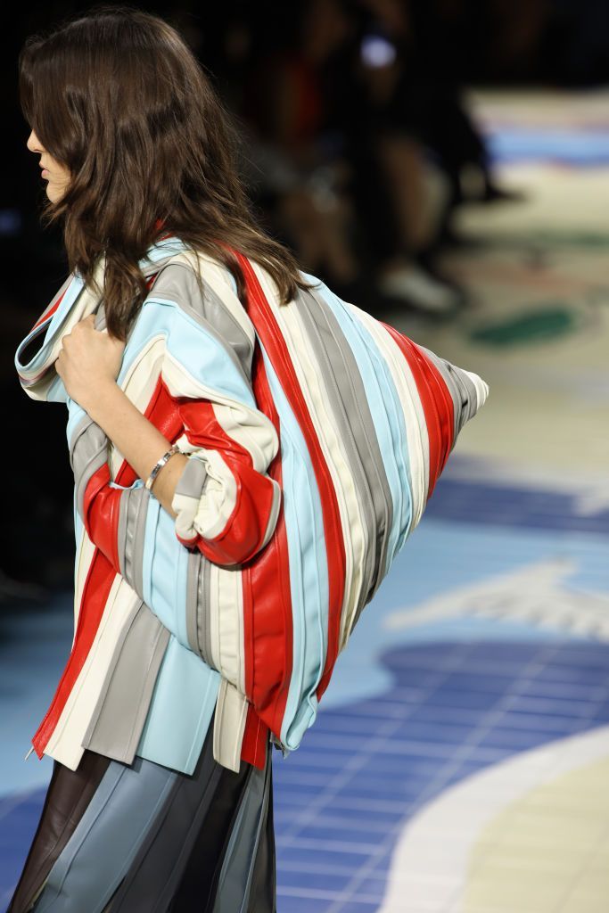 a woman carrying a backpack