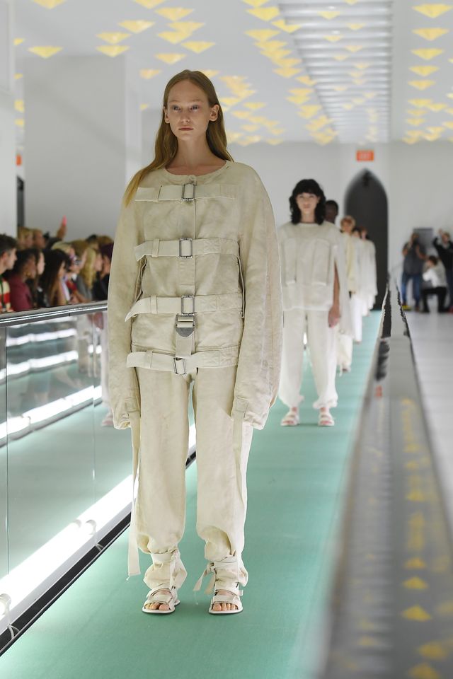 Model Ayesha Tan-Jones Protests Gucci's Straitjacket While Walking Runway