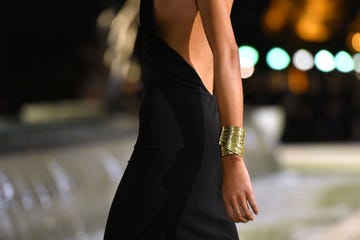 model binx walton walking the saint laurent runway during paris fashion week spring summer 2023