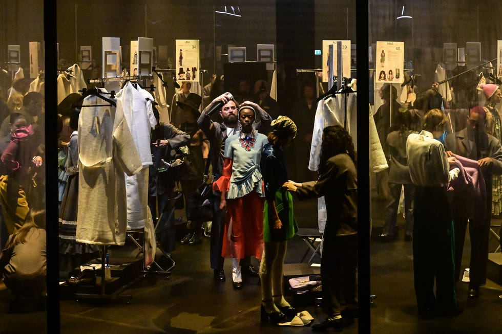 Gucci - Structured with tiers of ruffles a tulle and lace gown is worn with  bow-trimmed gloves, photographed for the preparations for the women's Gucci  Fall Winter 2020 fashion show by Alessandro