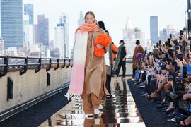 a model walks the cos runway