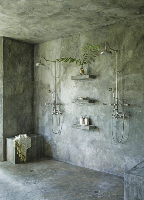 en suite bathroom
“i wanted it to feel calm, quiet, and seamless,” says
liess of the concrete, cave like shower area coated
in waterproof stucco hardware existing