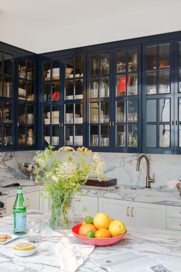glass cabinetry in navy