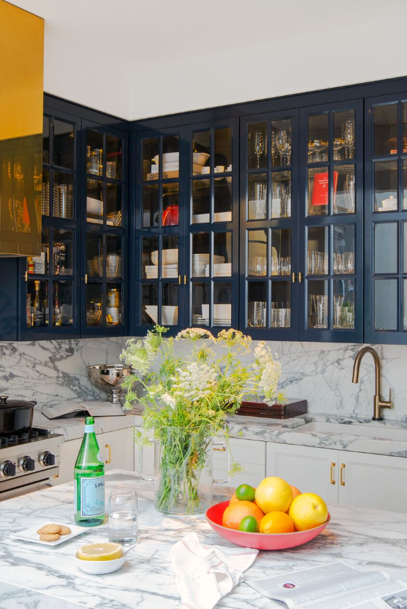 glass cabinetry in navy