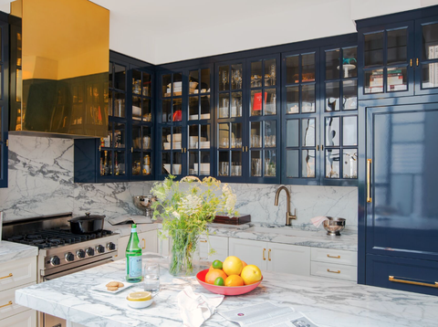 glass cabinetry in navy